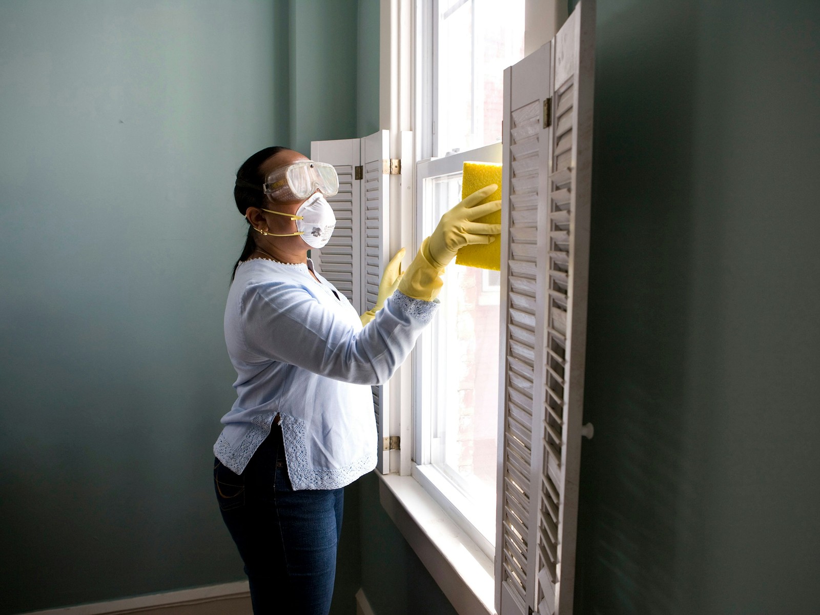 A cleaner working through a home top to bottom with the premium product kit